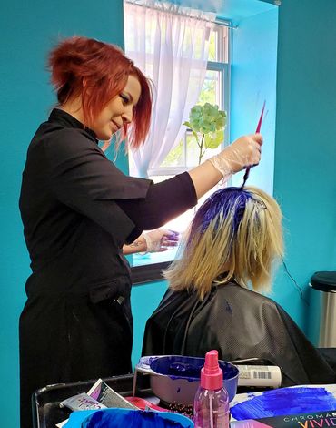 Stylist Dyes Woman Hair — Washington, WI — North Shore Hair Design Inc