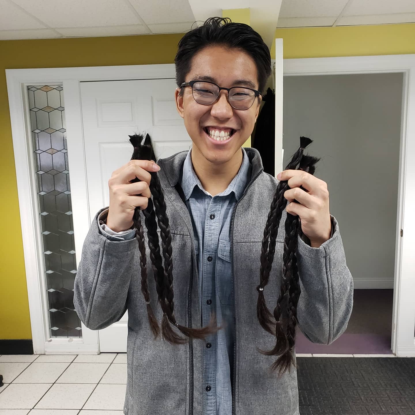 Man Donating Hair — Washington, WI — North Shore Hair Design Inc