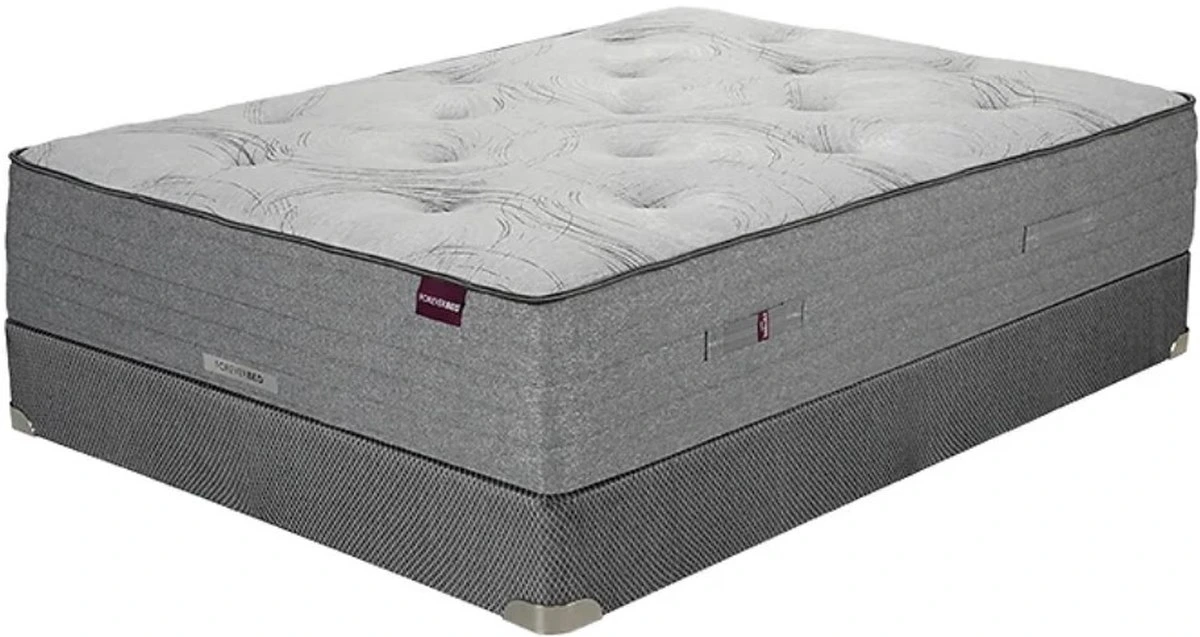 A grey mattress and box spring set on a white background, with tufted top and a purple brand label.