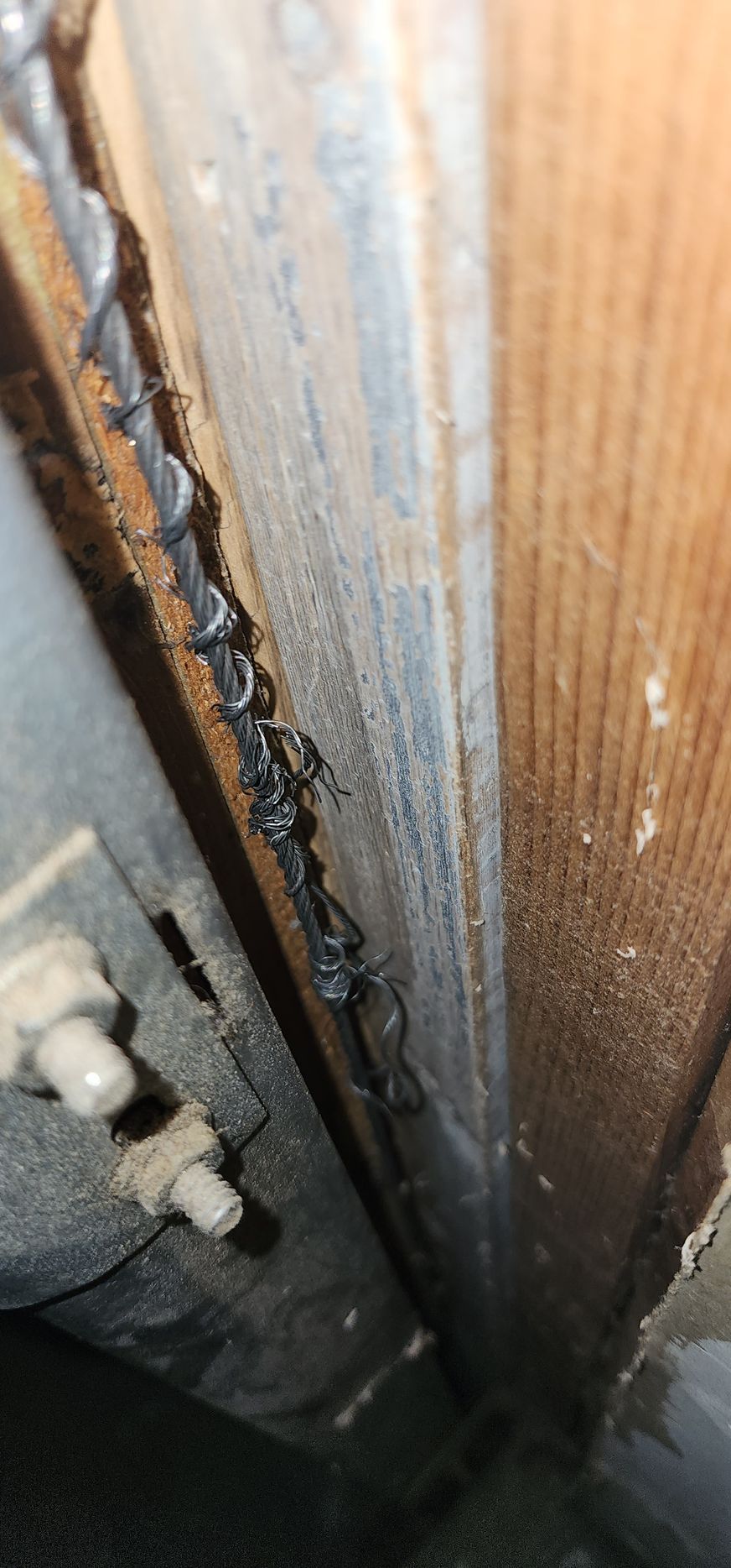 Frayed Garage Door Cables are dangerous and need repair.