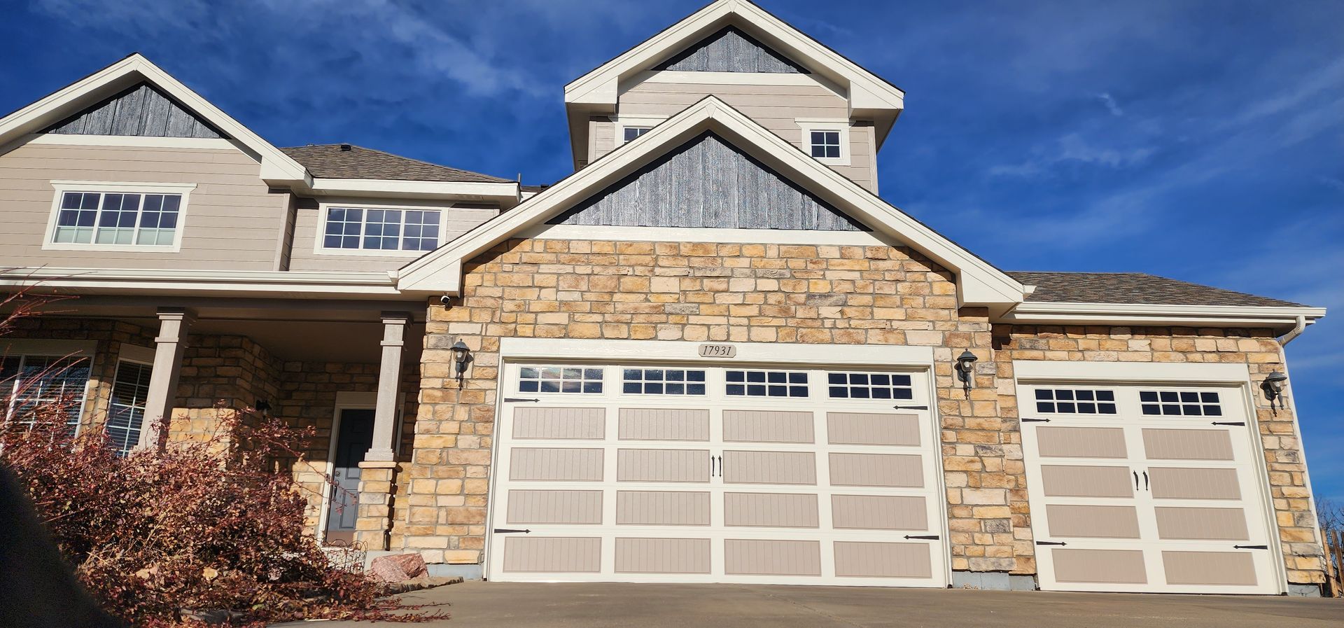 16x8 and 9x8 Garage Doors Long Panel Stamped Carriage. Installed by Aeonic Garage Doors in Arvada Colorado 