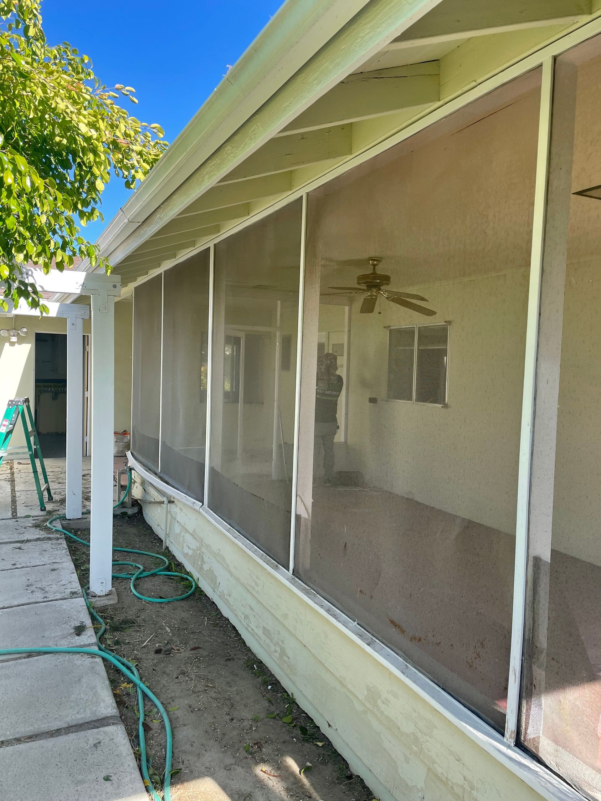 Installed by Mobile Screen Repair, a white screen screened-in patio in Riverside, CA.