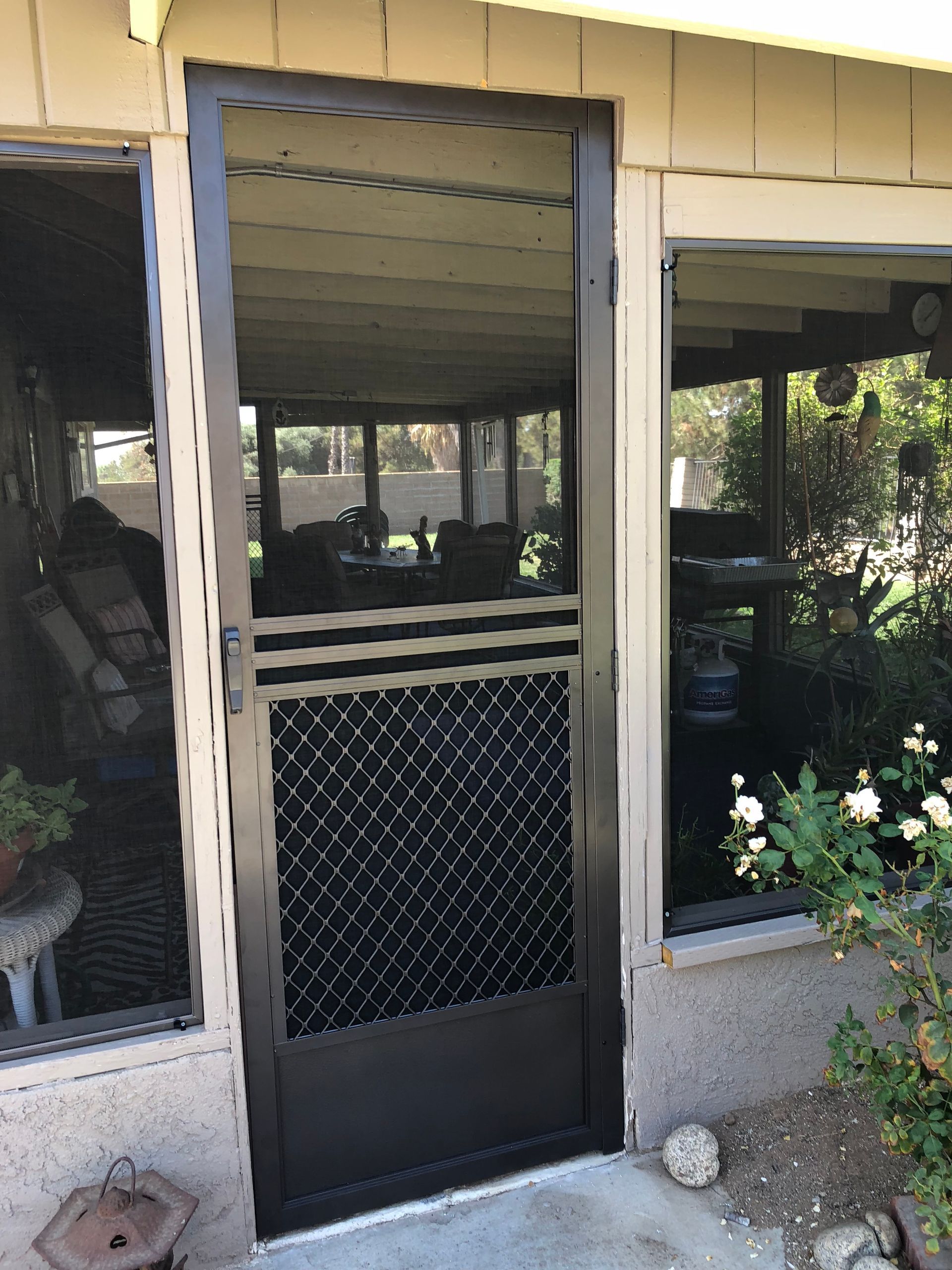 Installed by Mobile Screen Repair, a premium door with an Esses design in Riverside.