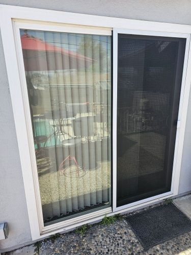 Patio sliding screen door installed on residential home. Mobile Screen Repair in Riverside, CA