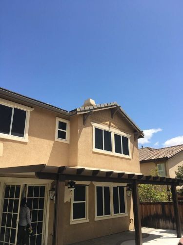 Residential home with newly installed solar screens. Mobile Screen Repair in Riverside, CA