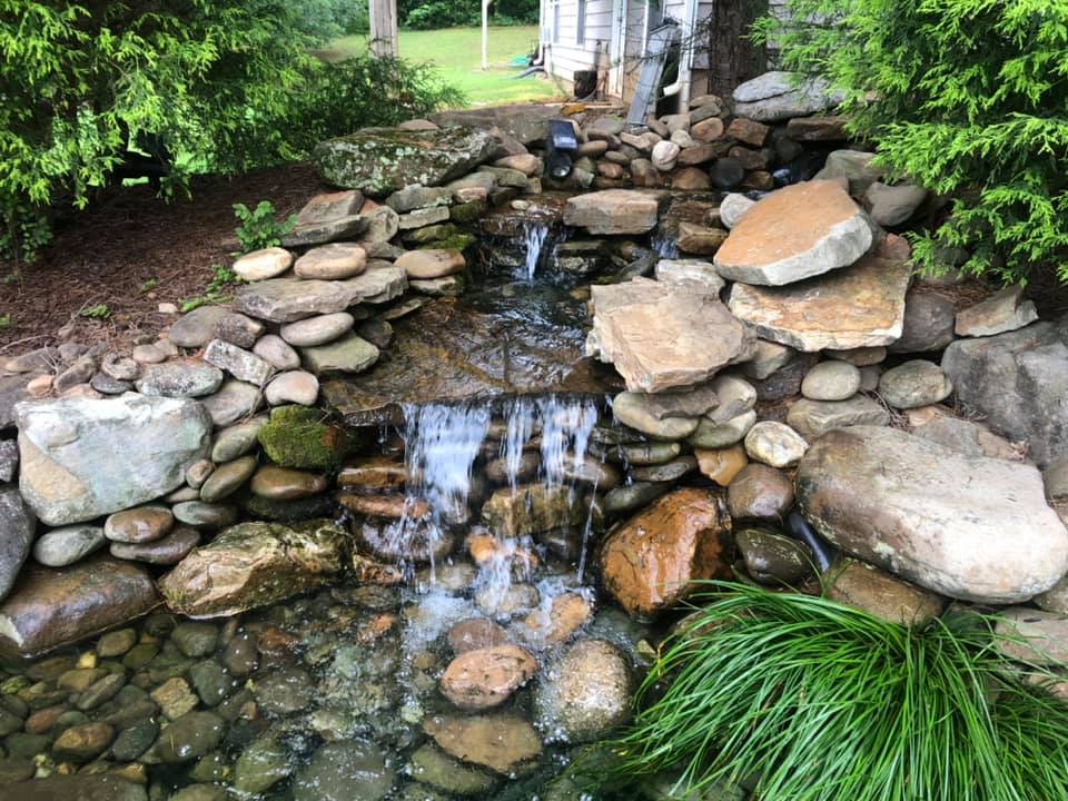 Adding Water on the Pond — Newnan, GA — Aqua Gardens