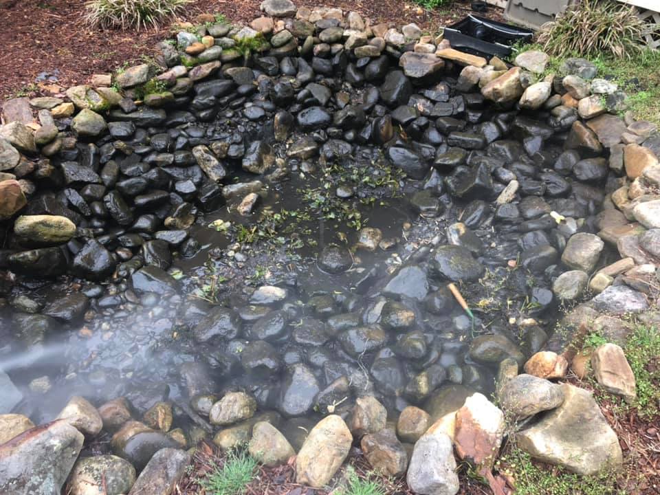 Pond with Black Stones — Newnan, GA — Aqua Gardens