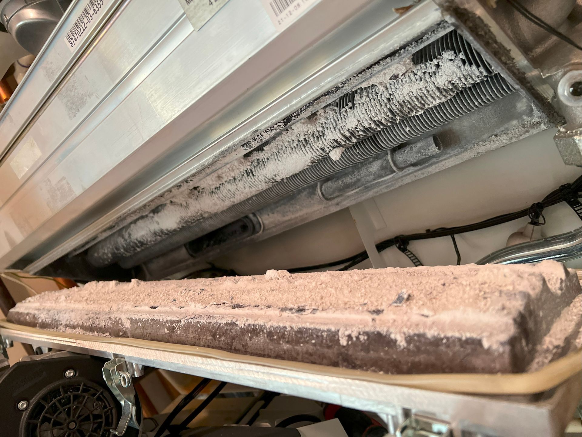 Air conditioning unit with heavy ice buildup on the coils.