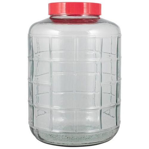Clear glass fermentation jug with red lid.