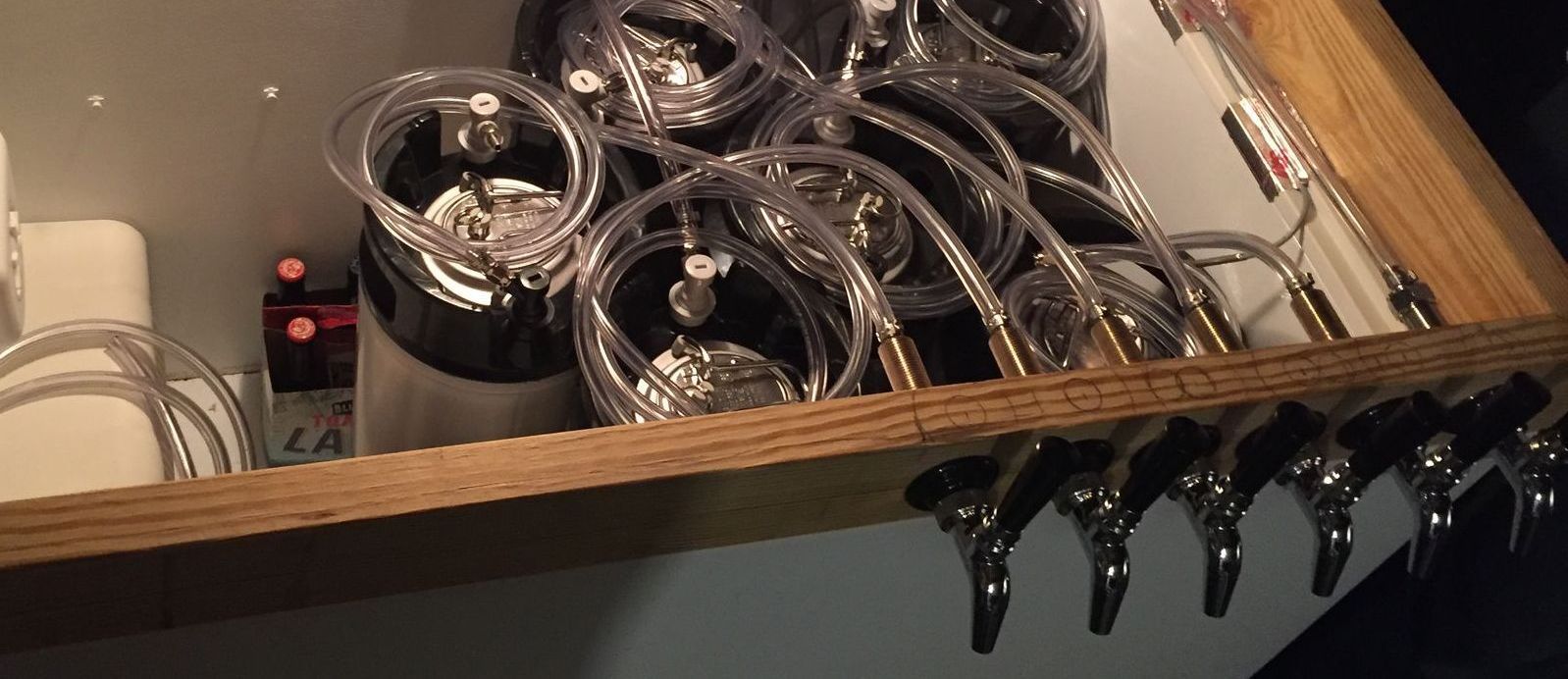 A shelf with a bunch of glasses on it