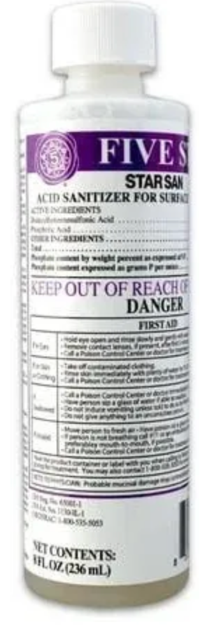 A bottle of liquid with a purple label on a white background.