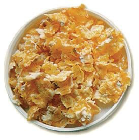 A close up of a pile of corn flakes on a tray.