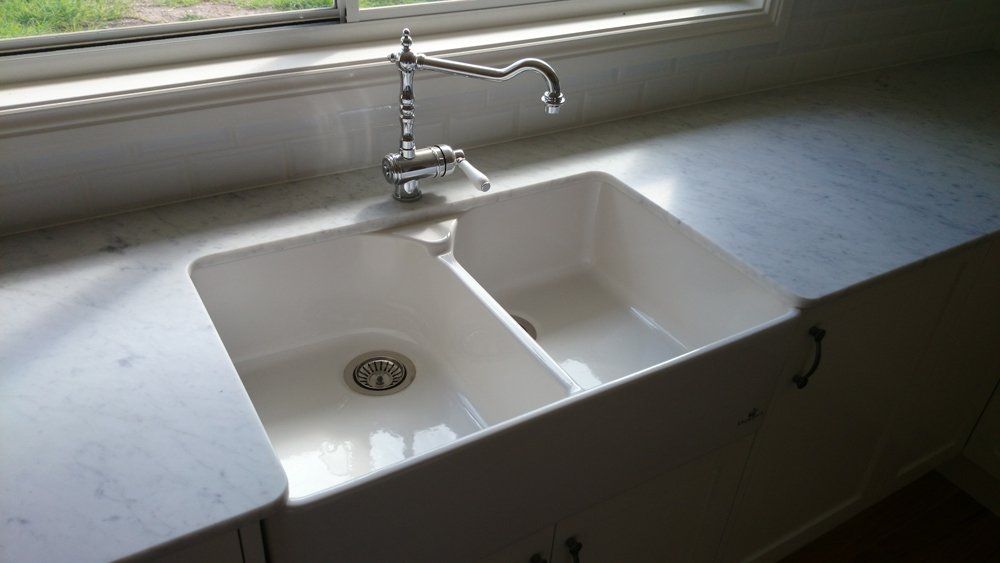 White Double Kitchen Sink with Stainless Steel Tap — Styles and Finishes in Balaclava NSW