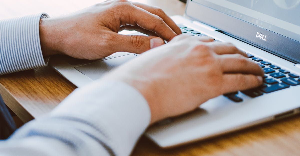 image of hands under the keyboards. 