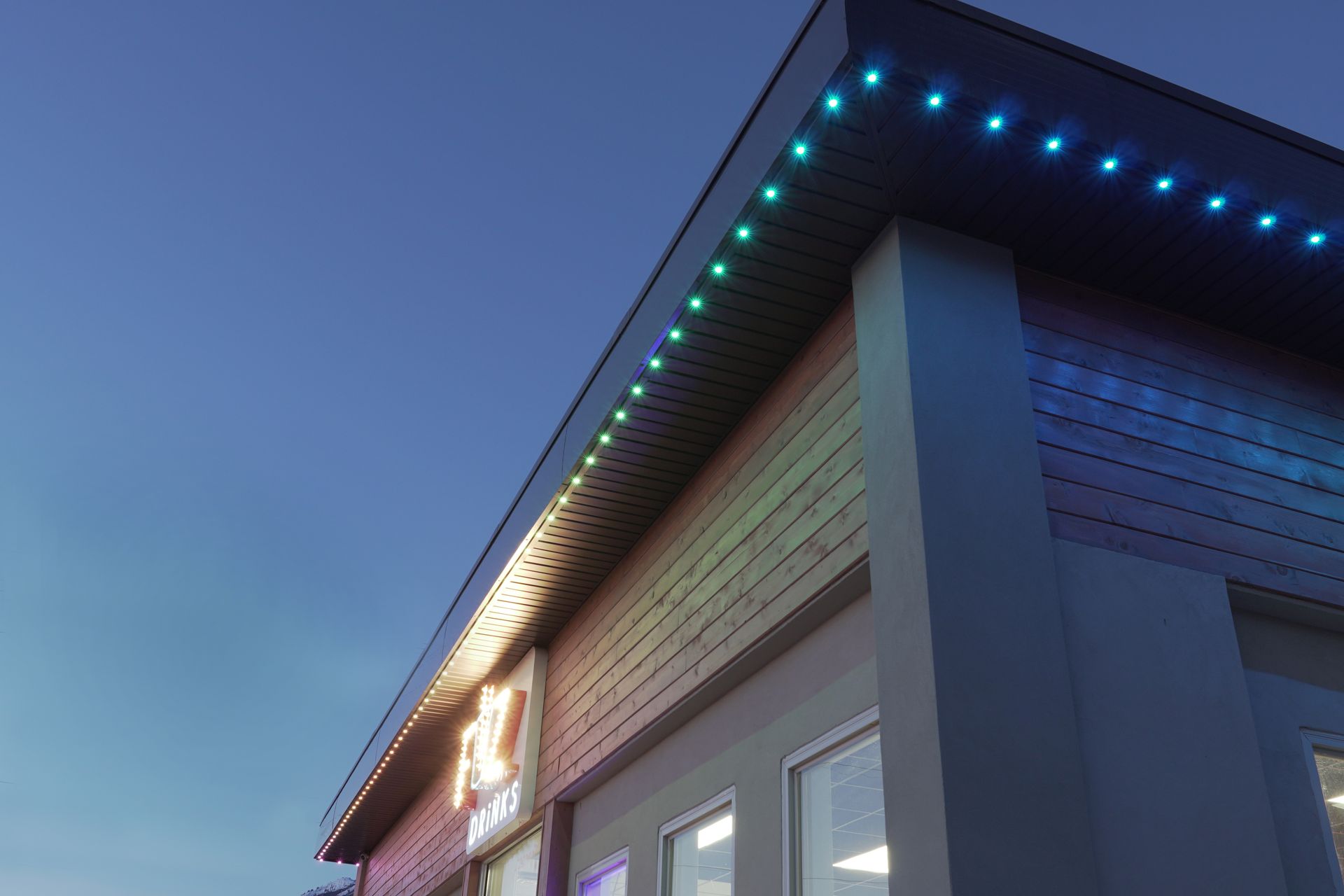 A building with a lot of lights on it at night.