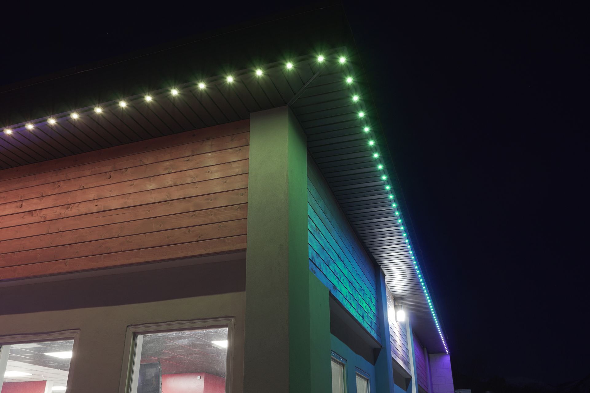 A building with a lot of lights on it at night.