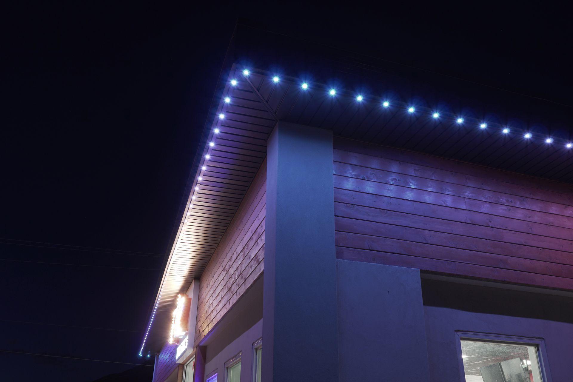 A building with a lot of lights on it at night.