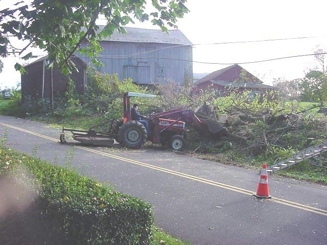 Tractor Clears Road — Allentown, PA — Hire A Husband, Inc.