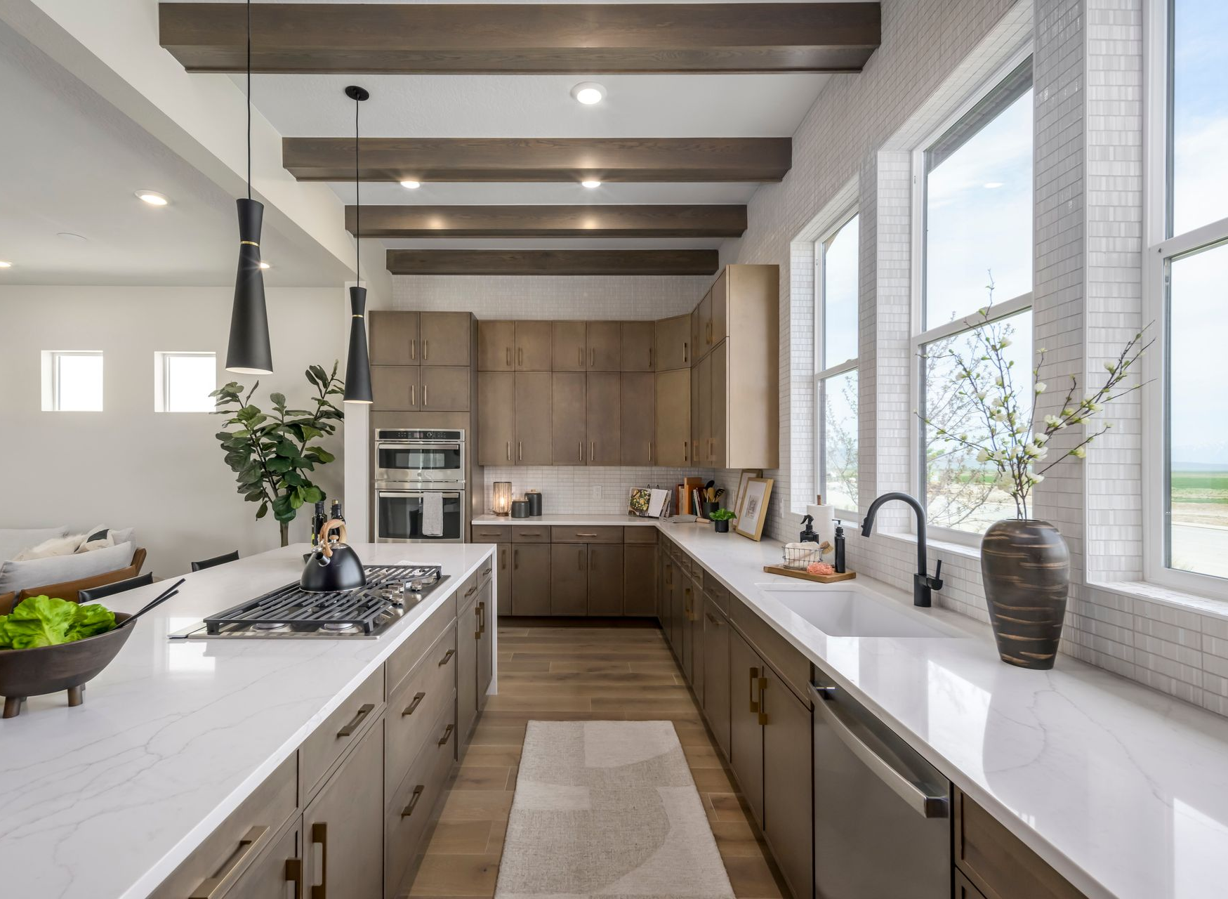 Sandstone canyon walls in shades of brown and orange, with sunlight filtering from above.