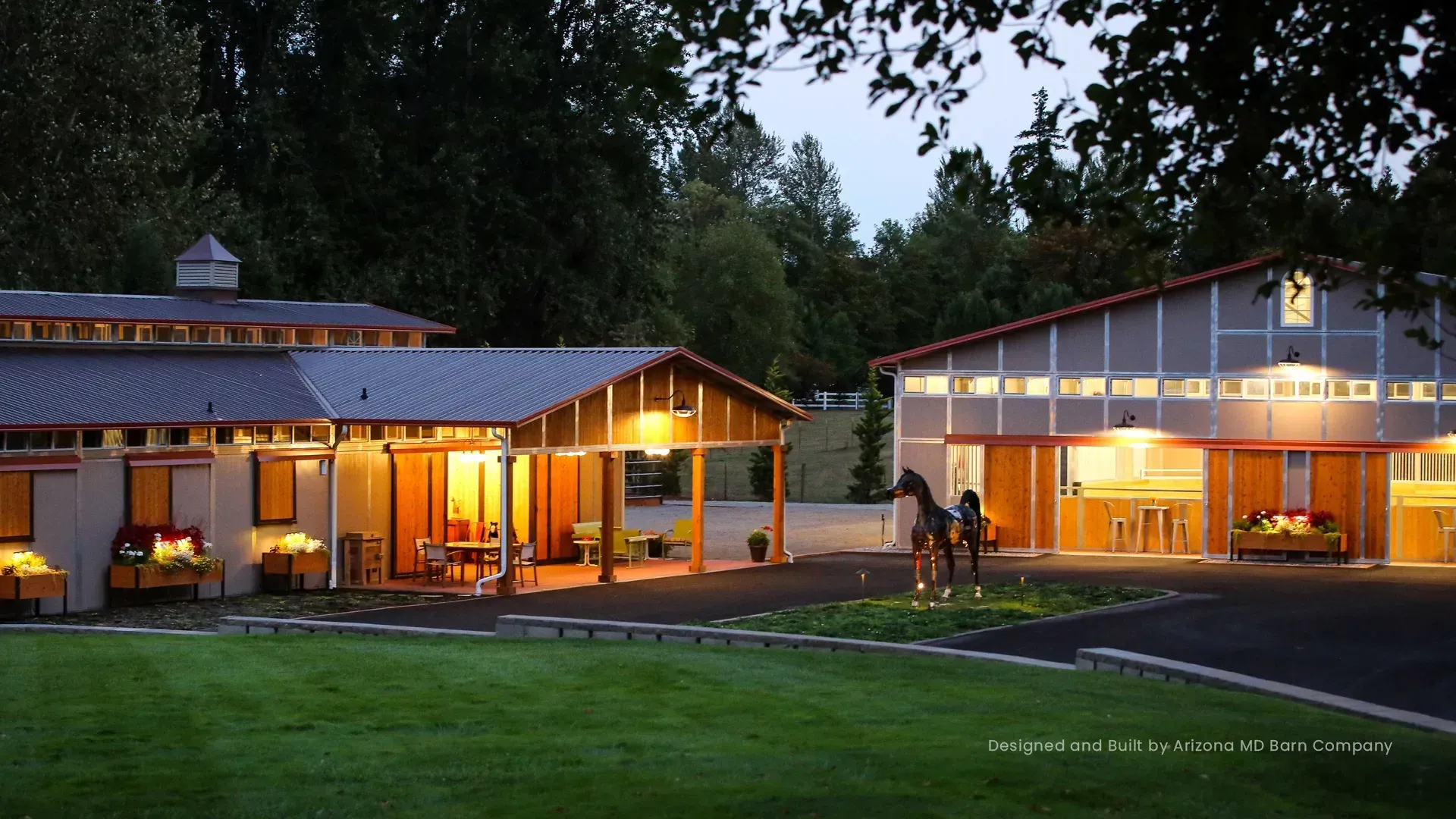 A horse is standing in front of a large building