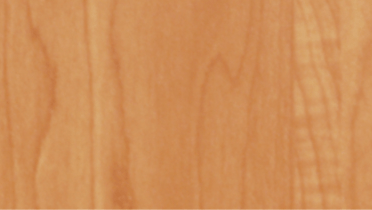 A close up of a piece of wood showing the grain of the wood.