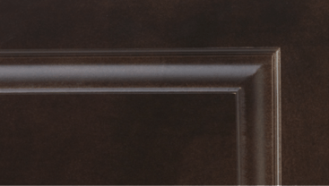 A close up of a brown wooden door with a clear frame.