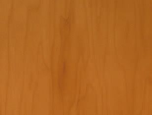 A close up of a piece of wood showing the grain and texture.