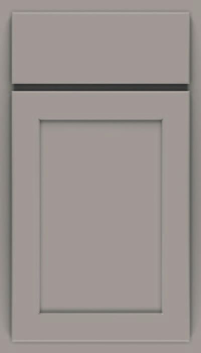 A close up of a green cabinet door on a white background.