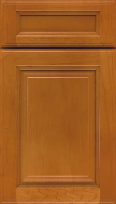 A close up of a wooden cabinet door on a white background.