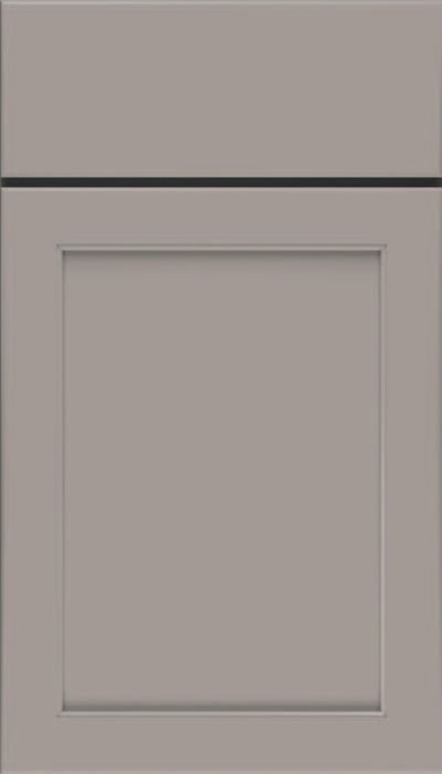 A close up of a gray cabinet door on a white background.