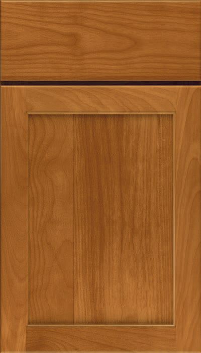 A close up of a wooden cabinet door.