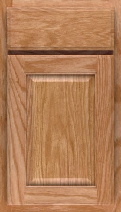 A close up of a wooden cabinet door with a drawer.