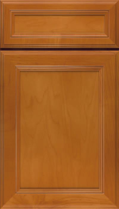 A close up of a wooden cabinet door with a drawer.
