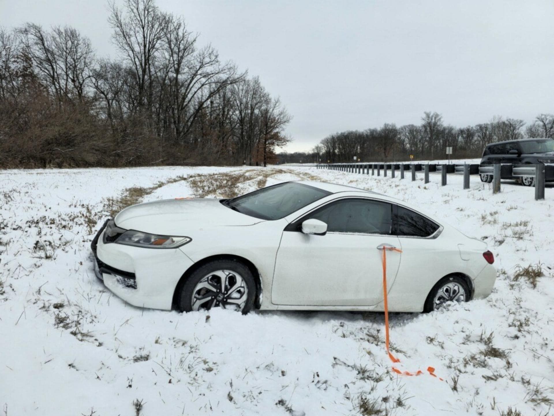 Disabled car off the side of I-74 needing auto towing in Danville, IL by a local towing company