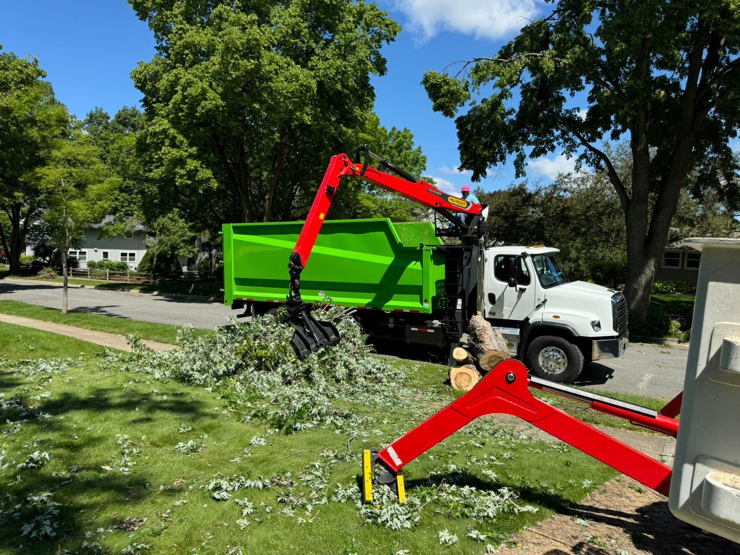 Photo Of Man And Garbage Truck — Baraboo, WI — Williams Tree Maintenance