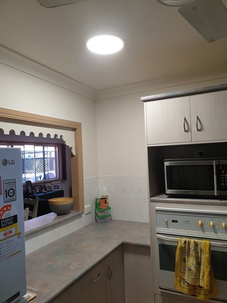 Kitchen Area With Solar Light In The Ceiling — Insulation In Mount Louisa, QLD