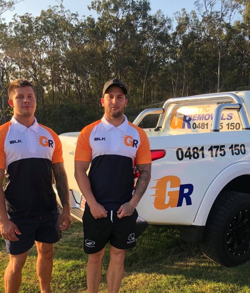 Two Men Standing Next to a Truck — Gantic Removals & Storage in Tivoli, QLD