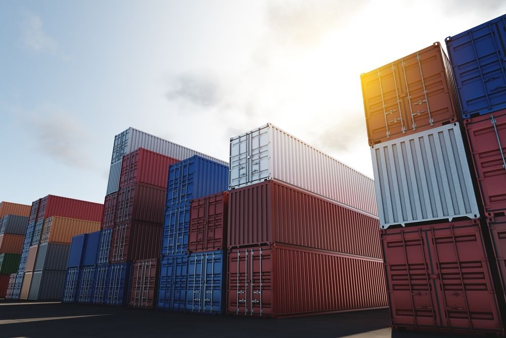 Shipping Containers Stacked Outdoors, Varying Colors — Gantic Removals & Storage in Springfield, QLD