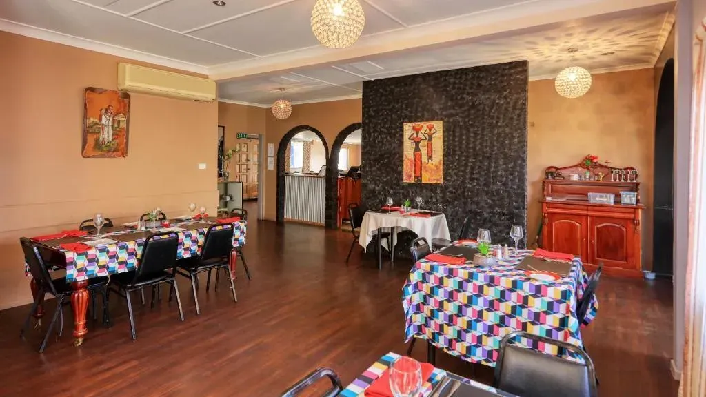 Restaurant Dining Area with Tables Set for Service — Townview Motel In Mount Isa, QLD
