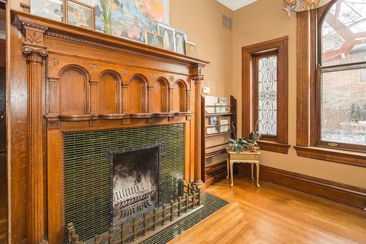 There is a fireplace in the middle of the room.