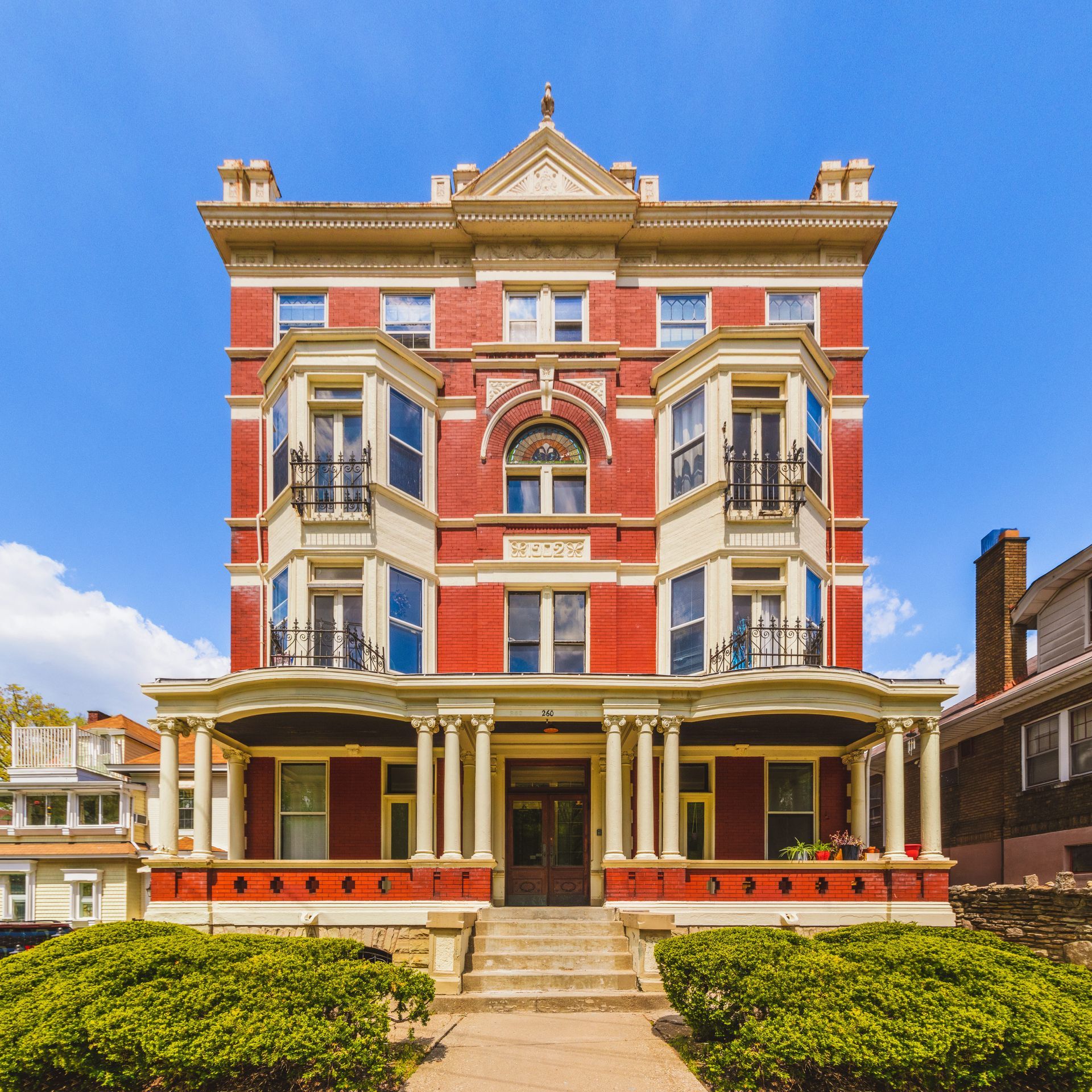 A large red brick building with the word liberty on it