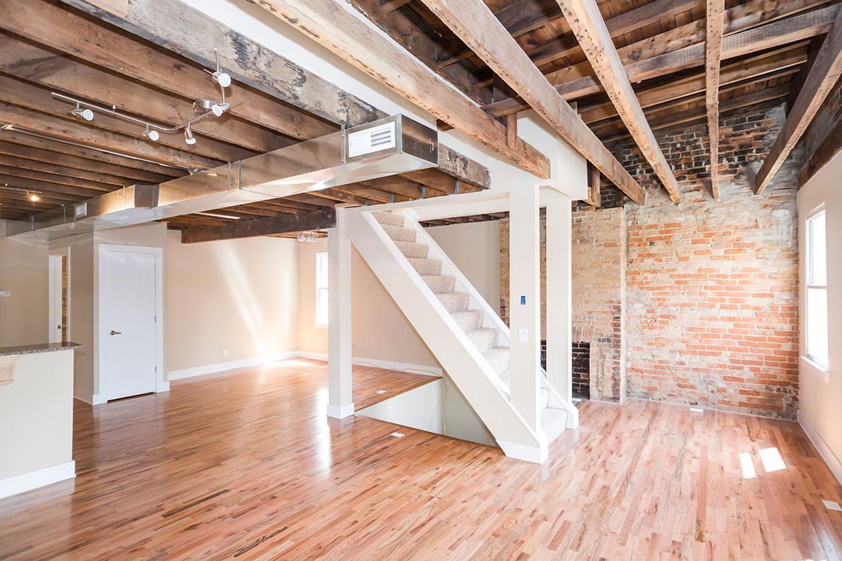 There is a staircase in the middle of the room.