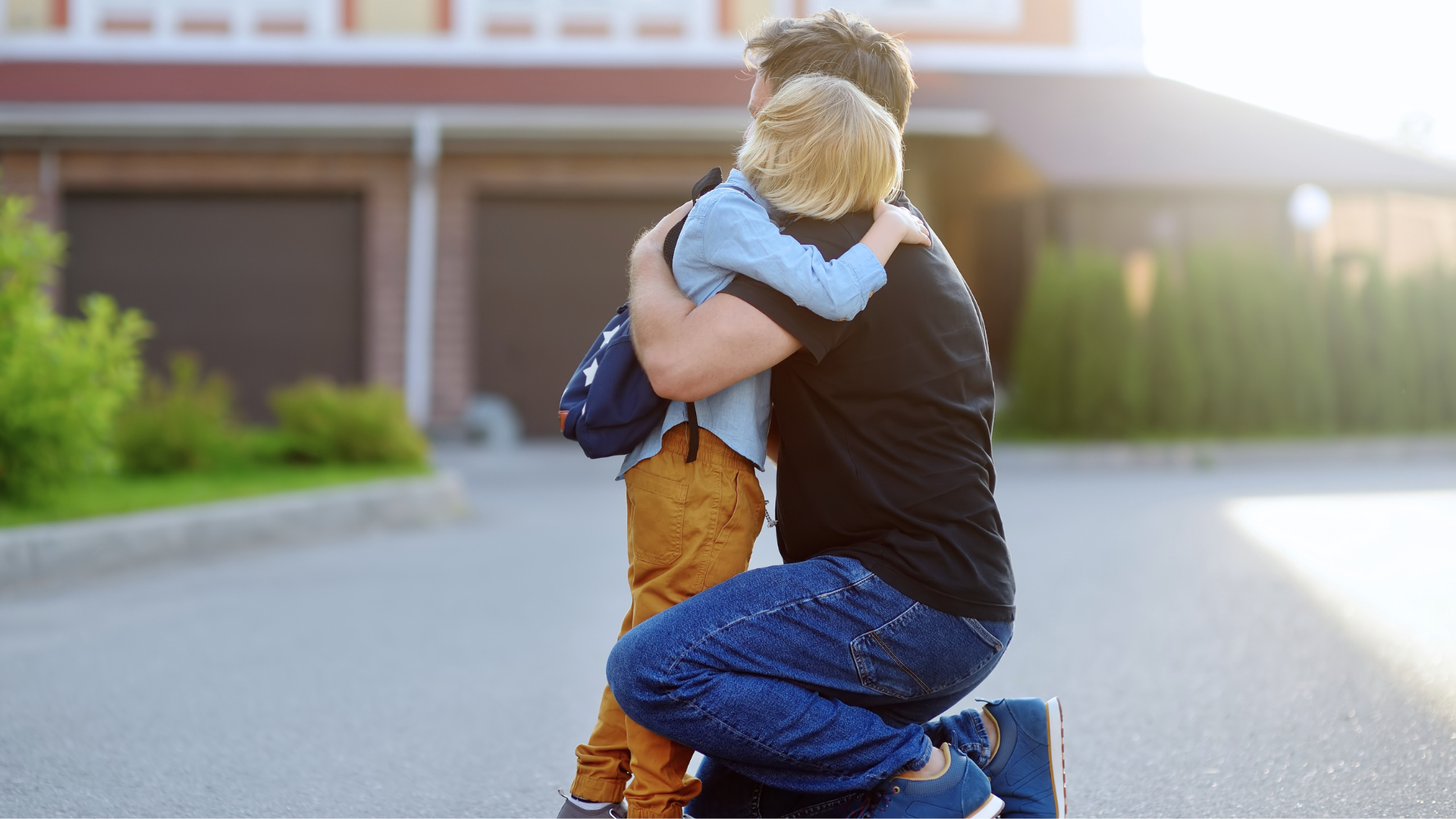Child hugging parent