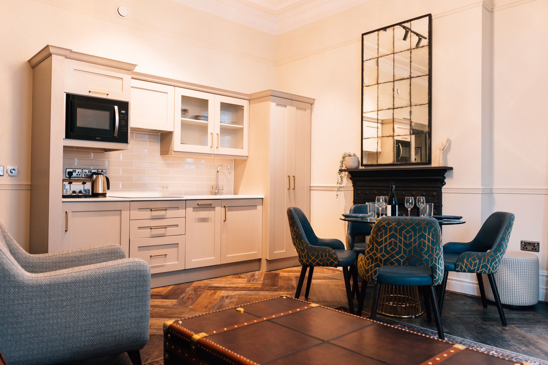 Small apartment with a kitchen, dining area, and living space. 