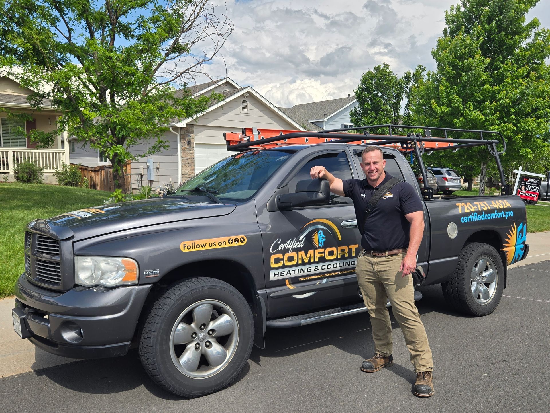Man stands by truck advertising