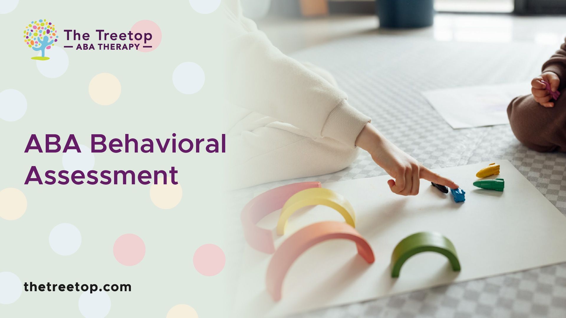 Person's hand pointing to colorful toys on white paper during an ABA behavioral assessment.