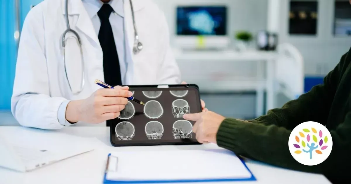 Doctor showing brain scan images to a patient in a clinic office