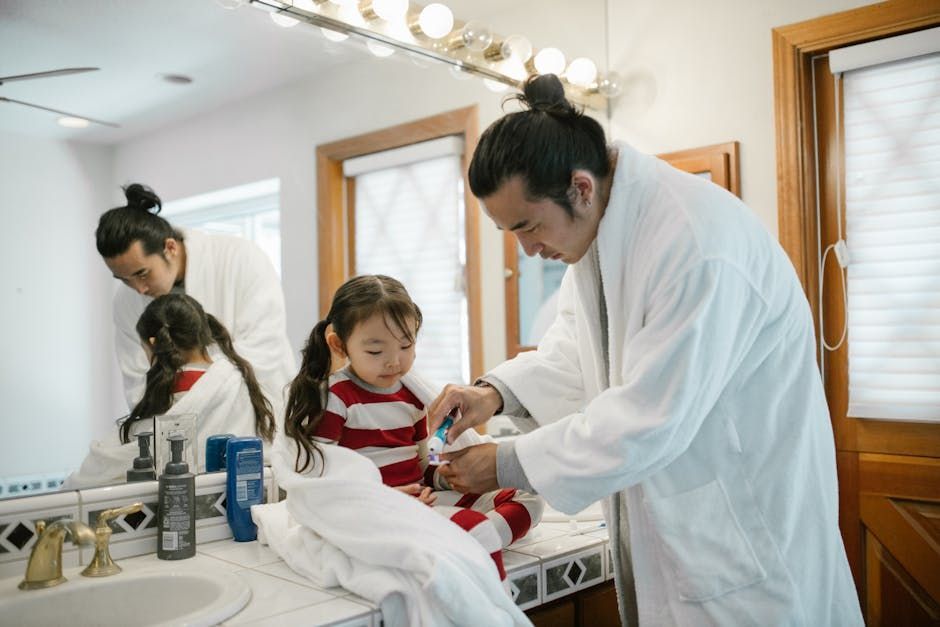 Parent and young child going through a morning routine together at home