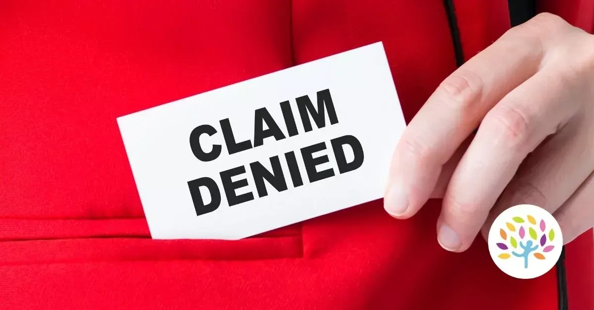 A hand holds a white card with the words 