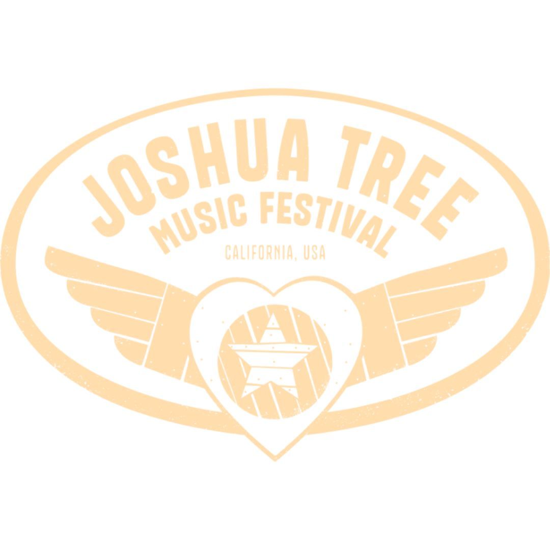 A rock climber ascends a granite cliff face, secured by gear, with a belayer standing on a ledge below.